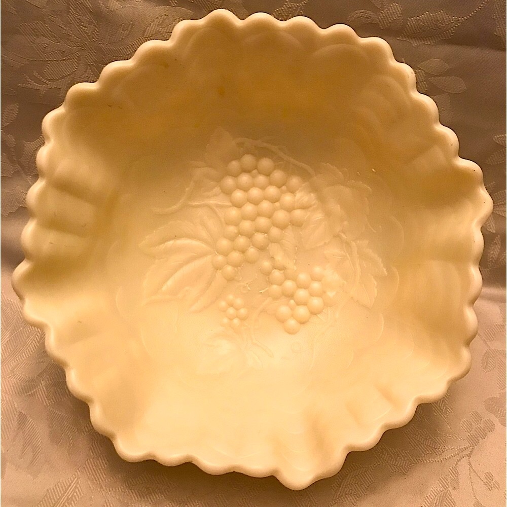 Pale Yellow Milk Glass bowl. 10”Grapevine design.